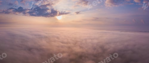 Preview: Beautiful Foggy Sunrise Panoramic Landscape From Drone. Magical Sunrise Over The Clouds.