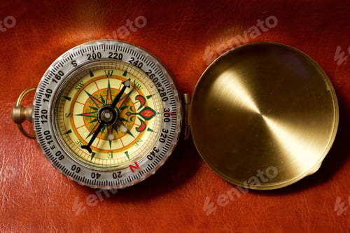 Preview: Vintage Compass On A Leather Surface.