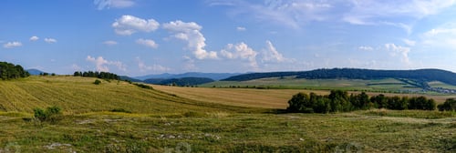 Preview: Countryside Landscape Under Blue Sky And Dramatic White Clouds In Summer