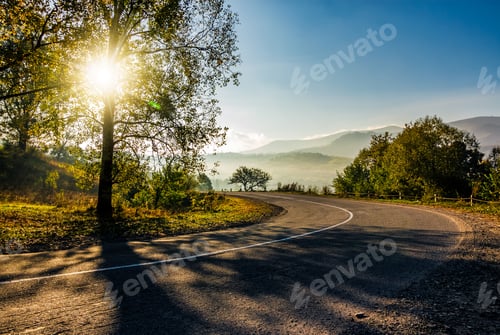 Preview: Countryside Road Down To The Valley At Sunrise. Beautiful Bright Weather In Early Autumn