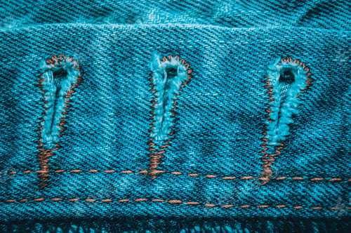 Preview: Clothing Items Blue Washed Faded Jeans Cotton Fabric Texture With Seams, Clasps, Buttons And