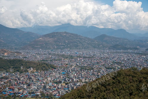 Preview: The Cityscape Of Pokhara With The Annapurna Mountain Range Covered In Snow At Central Nepal, Asia