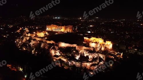 Preview: Aerial Birds Eye View Night Shot Taken By Drone Of Iconic Acropolis Hill, Propylaia And The