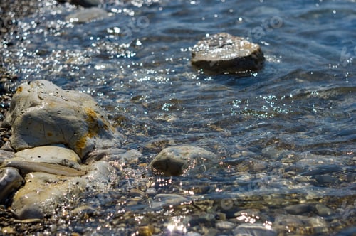 Preview: Pebble Stones On The Sea Beach, The Rolling Waves Of The Sea With Foam