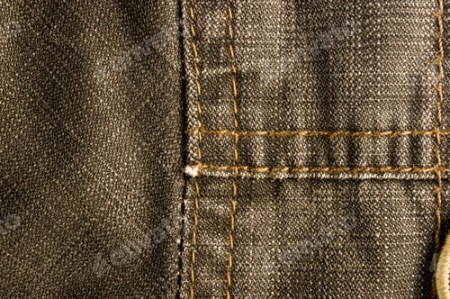 Preview: Clothing Items Stonewashed Cotton Fabric Texture With Seams, Clasps, Buttons And Rivets, Macro