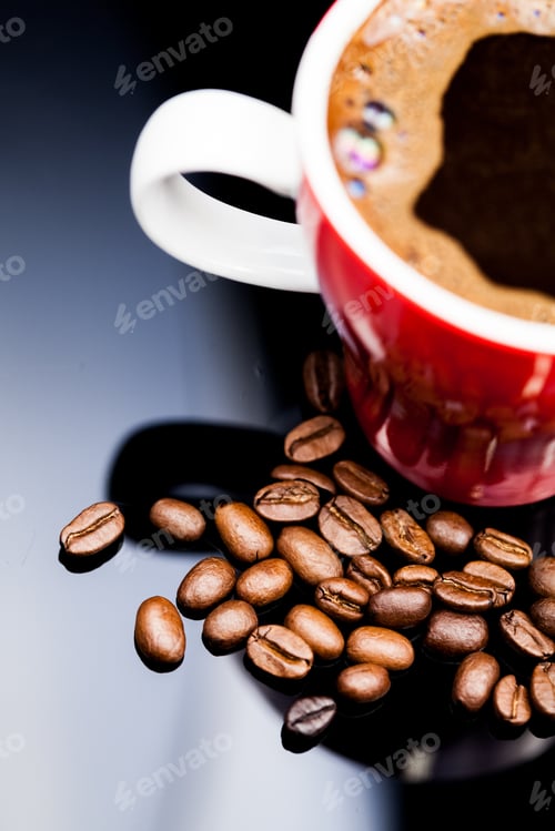 Preview: Red Cup Of Coffee With Coffee Beans And Dark Background
