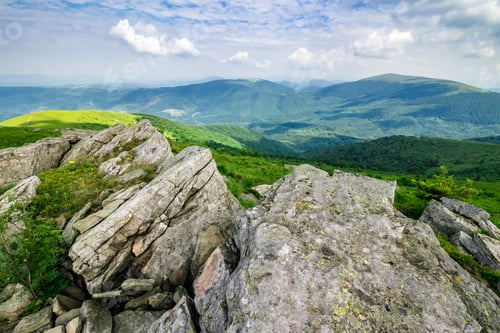 Preview: Mountain Landscape. Valley With Stones In Grass On Top Of The Hillside Of Mountain Range In Morning