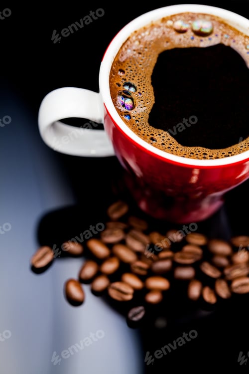 Preview: Red Cup Of Coffee With Coffee Beans And Dark Background