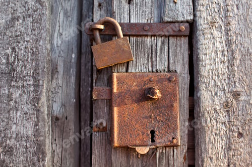Preview: Closeup Of A Rusty Padlock On A Wooden Door