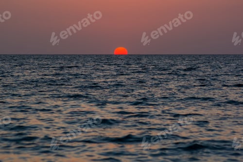 Preview: Amazing Sea Sunset On The Pebble Beach, The Sun, Waves, Clouds