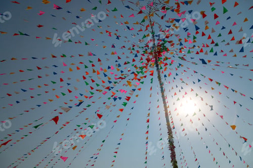 Preview: Multi-Color Triangle Pray Flags At Thai Celebration Festival With Cloud And Blue Sky Background