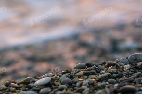 Preview: Pebble Stones On The Sea Beach, The Rolling Waves Of The Sea With Foam