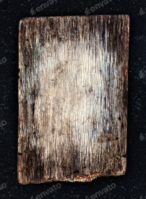 Preview: Old Wooden Board On The Dark Background Closeup