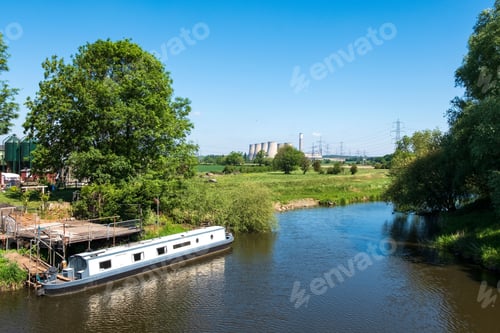 Preview: Narrow Boat Moored On A River Bank