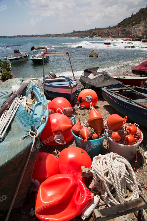 Preview: Collection Of Floats, Buoys, Ropes And More Fishing Amenities, Stored In Buckets Between Docked