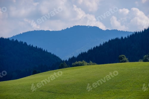 Preview: Western Carpathian Tatra Mountain Skyline With Green Fields And Forests In Foreground. Summer In