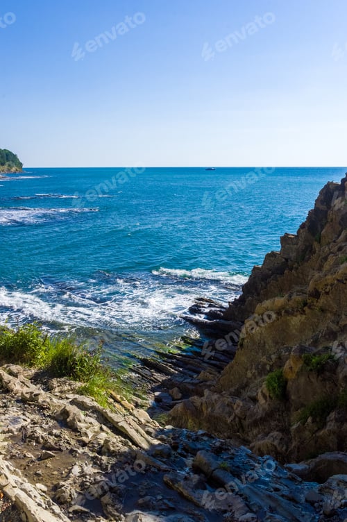 Preview: Sea Landscape Is A Pebbly Beach With Waves In White Foam