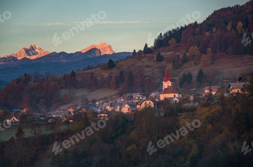Preview: Sunrise In Slovenian Countryside With Village Zasip Below Triglav And Julian Alps.