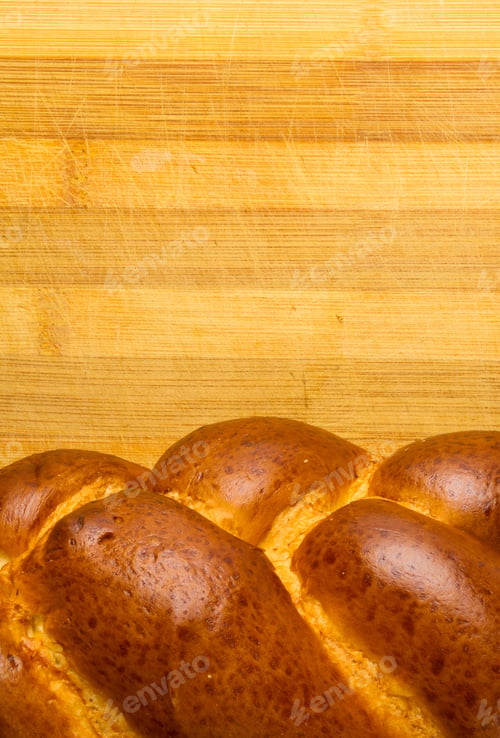 Preview: Chunks Large Braided Loaf On Wooden Background