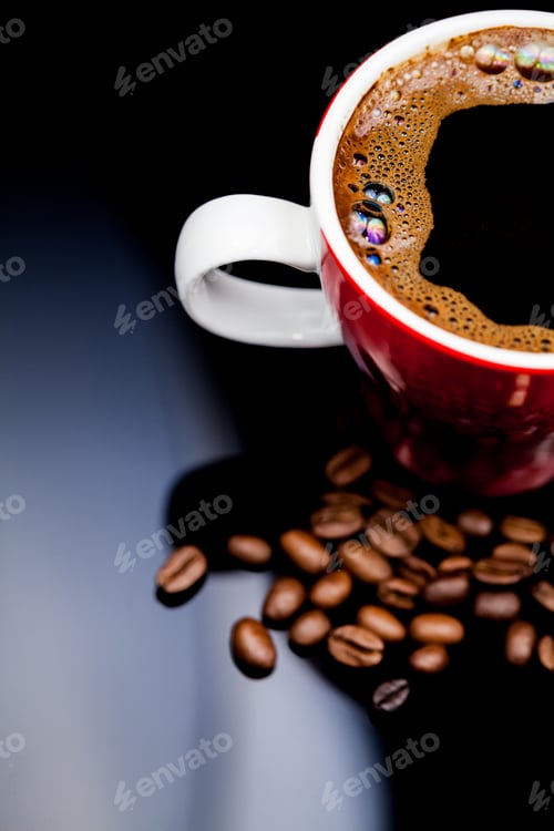 Preview: Red Cup Of Coffee With Coffee Beans And Dark Background
