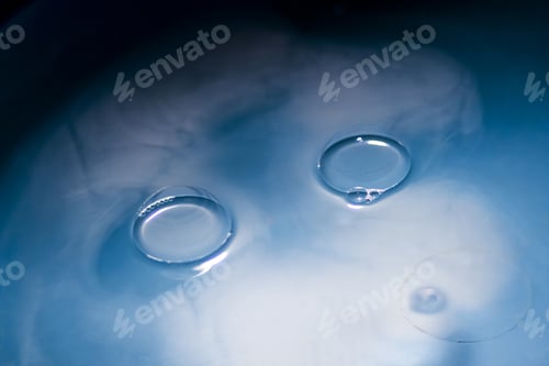 Preview: Abstract Shot With Big Soap Bubbles On A Water Surface With Smoke Inside. Image Has Grain Texture