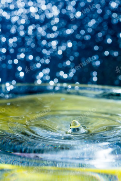 Preview: Abstract, Colorful Composition With Small Bokeh Lights And Water Texture. Can Be Used As Christmas