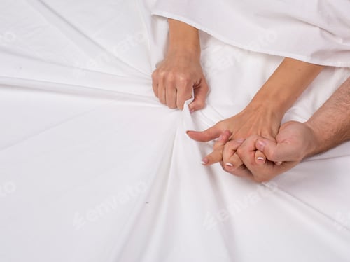 Preview: Sex On White Sheets. Close Up View Of Couple'S Hands