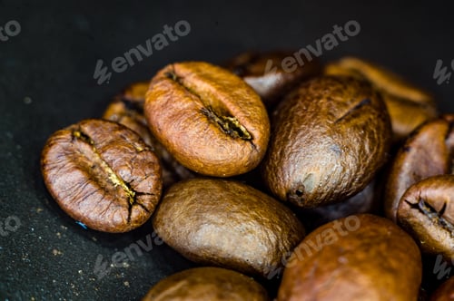 Preview: Brown Roasted Coffee Beans On Black Background, Close Up, Macro