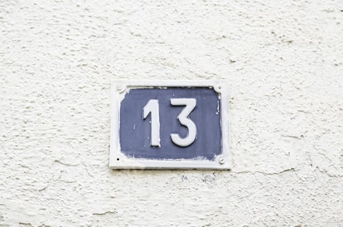 Preview: Number Thirteen On A Wall In A House, Detail Of A Wall With A Figure On A Plate