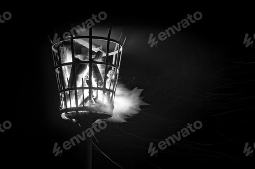 Preview: A Signal Beacon On Fire With Smoke And Sparks In Monochrome.