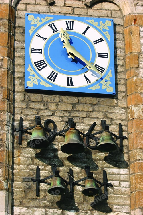 Preview: City Clock And Bells On Old Building Wall