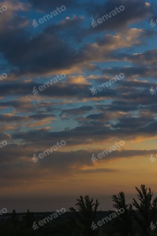 Preview: Landscape With Dramatic Light - Orange Clouds And The Outline Of Trees At Sunrise