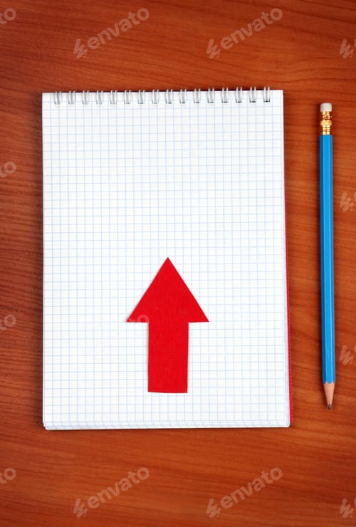 Preview: Blank Writing Pad With Red Arrow And Pencil On The Table