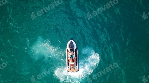 Preview: Aerial Drone Top View Photo Of Jet Ski Low Speed Cruising In Tropical Turquoise Clear Waters