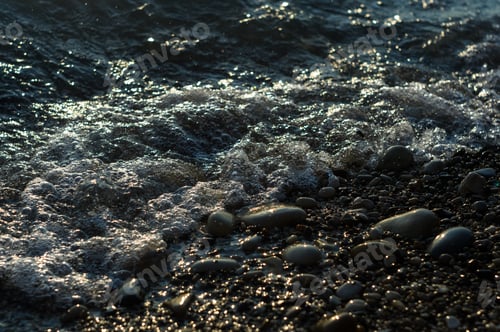 Preview: Pebble Stones On The Sea Beach, The Rolling Waves Of The Sea With Foam