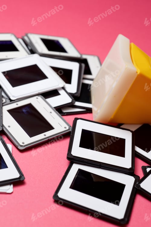 Preview: Slides And Slide Viewer On A Pink Table.