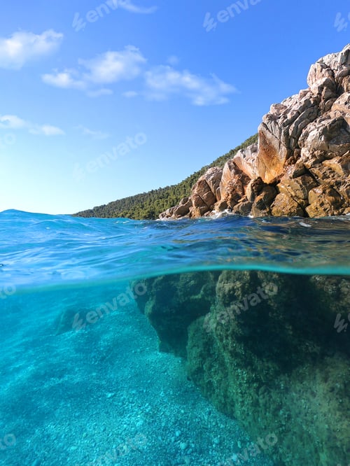 Preview: Underwater Split Photo Above And Below Of Crystal Clear Turquoise Paradise Caribbean Island