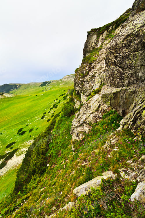 Preview: Landscape With A Rocky Cliff From Parang Mountains In Romania