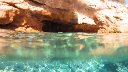 Preview: Sea Level Photo Of Clear Turquoise And Sapphire Water Sea Cave