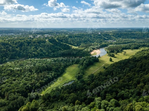 Preview: Drone Image. Aerial View Of Rural Area With Dramatic Clouds Over River Of Gauja In Sigulda