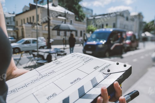 Preview: Assistant Director With Clapperboard On Set. Close-Up Of Firecrackers For Filming A Movie