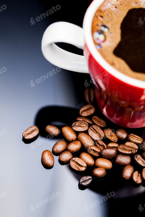 Preview: Red Cup Of Coffee With Coffee Beans And Dark Background