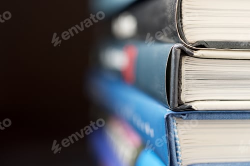 Preview: Books Stacked On A Table.