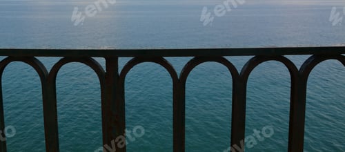 Preview: Iron Fence And Sea Background