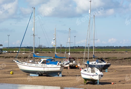 Preview: Small Boats Stranded At Low Tide At Wells Next The Sea, Norfolk, Uk