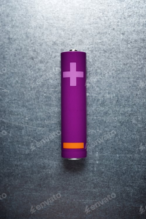 Preview: Small Battery On A Metal Table.