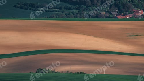 Preview: South Moravia Landscape And Farmland In The Spring With Rapeseed In The Fields.