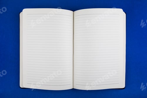 Preview: Blank Writing Pad On The Blue Paper Background Closeup