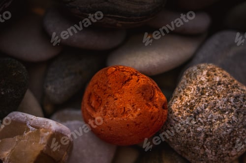 Preview: Boulders And Colorful Pebbles On The Beach