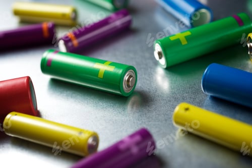 Preview: Many Batteries On A Metal Table.